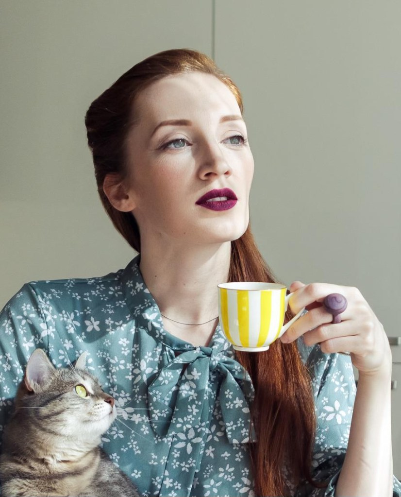 Childless Cat Lady sips tea with her cat